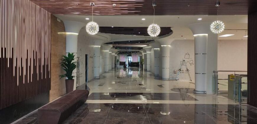 Commercial shop for sale in muscat hills at Pearl Muscat Building.