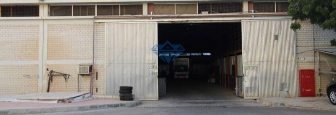 Double height Warehouse with office and cold store for Rent in Wadi kabir