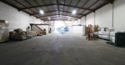 Double height Warehouse with office and cold store for Rent in Wadi kabir